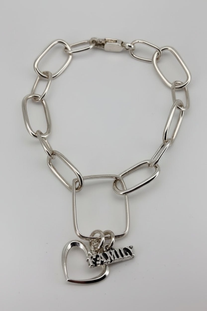 Handmade Silver chain bracelet with a heart charm and family charm Australian Made