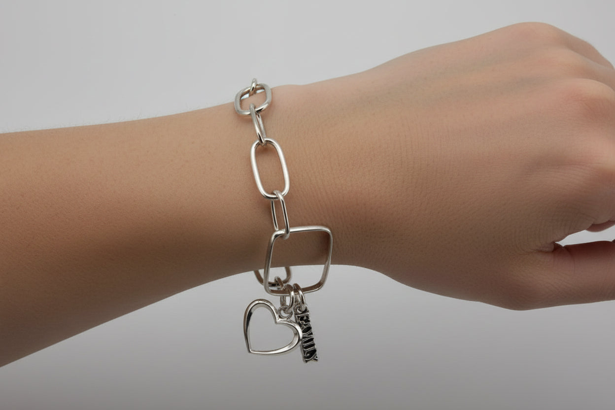 Handmade Silver chain bracelet with a heart charm and family charm, Perth Fremantle Artisan
