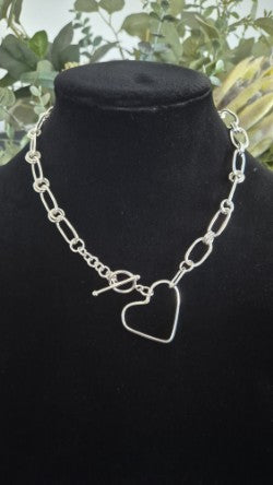 Silver chain necklace with a 14kt gold filled heart 